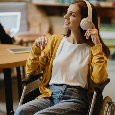 Person with disability listening to podcast